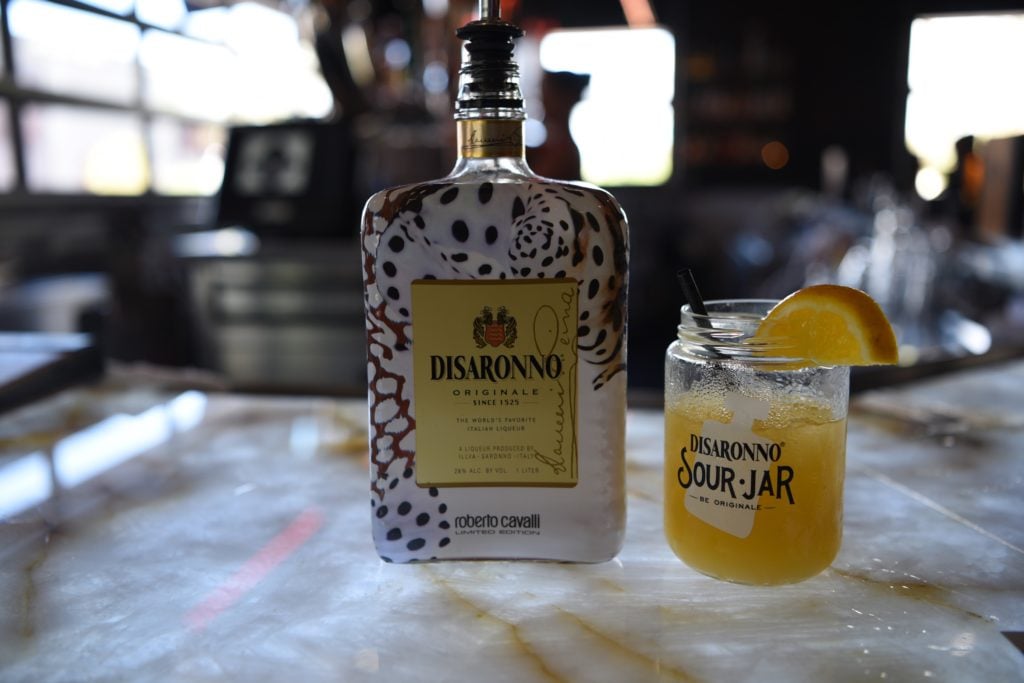 disaronno bottle with cocktail
