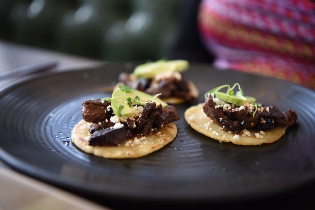 three tacos on a plate