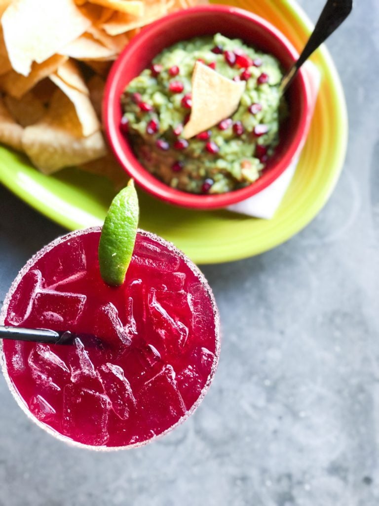 Margarita on the rocks with side of guacamole and chips