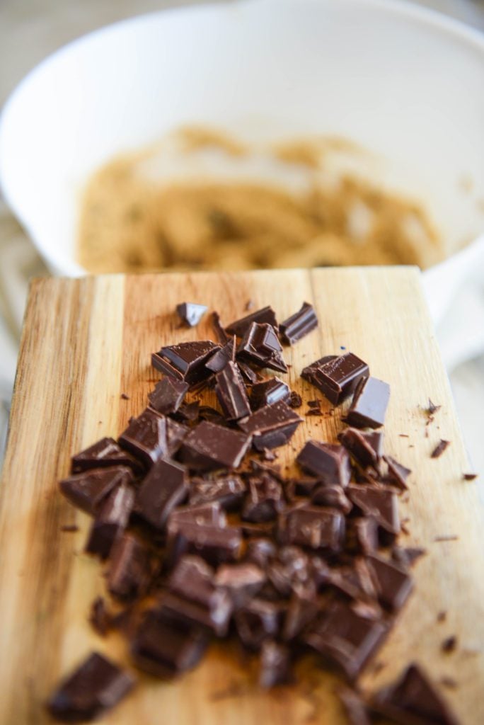 chocolate chopped in a wooden board