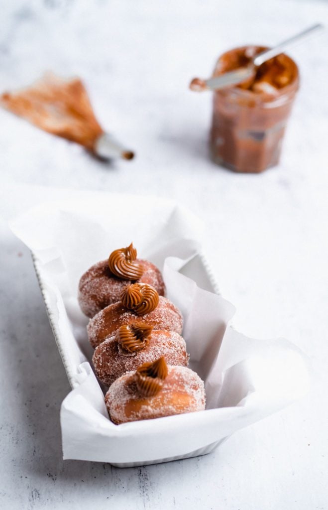 Dulce de leche donuts in a baking dish