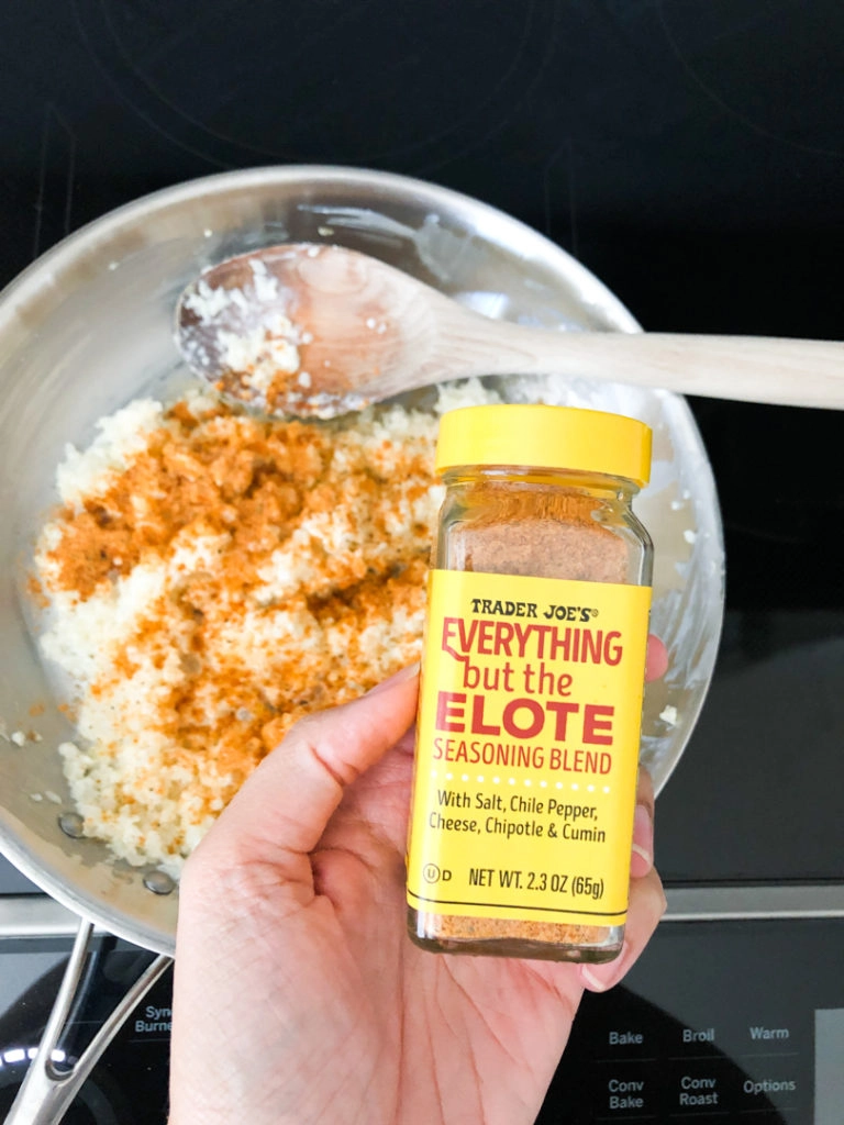 cauliflower in pan with elote seasoning