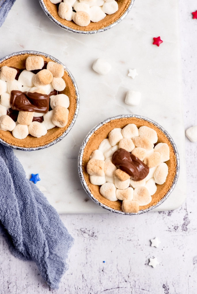 mini pies on a tray with napkin