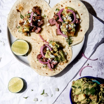 carne asada tacos on a plate