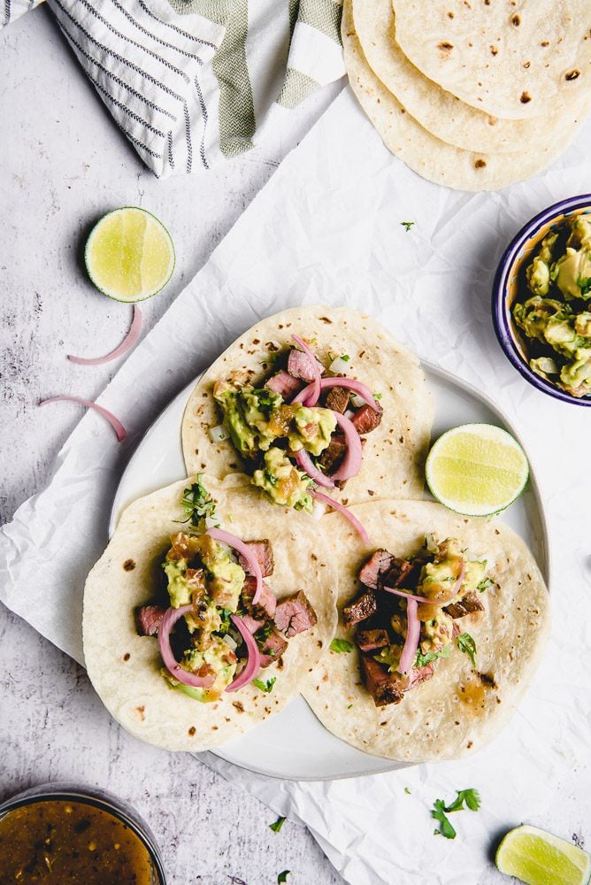 carne asada tacos on a plate