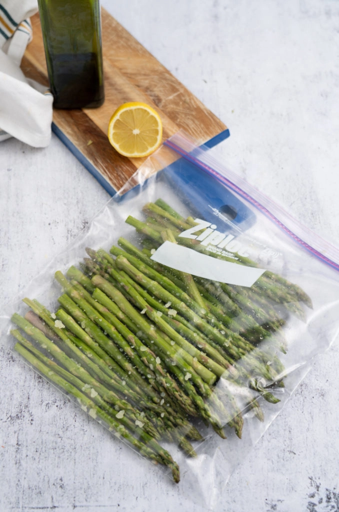 Asparagus in ziplock bag with lemon and garlic