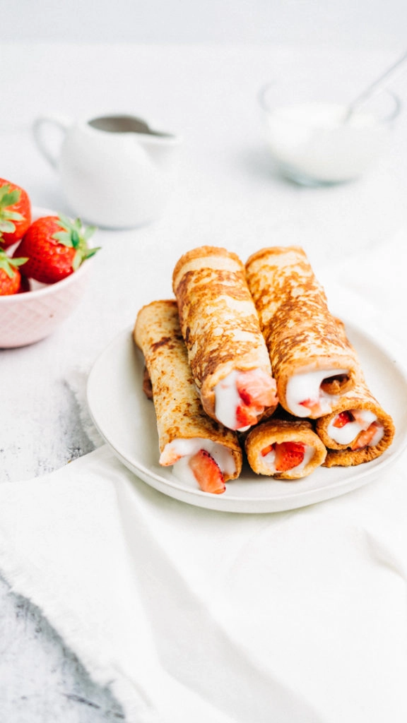 french toast rolls on a plate.
