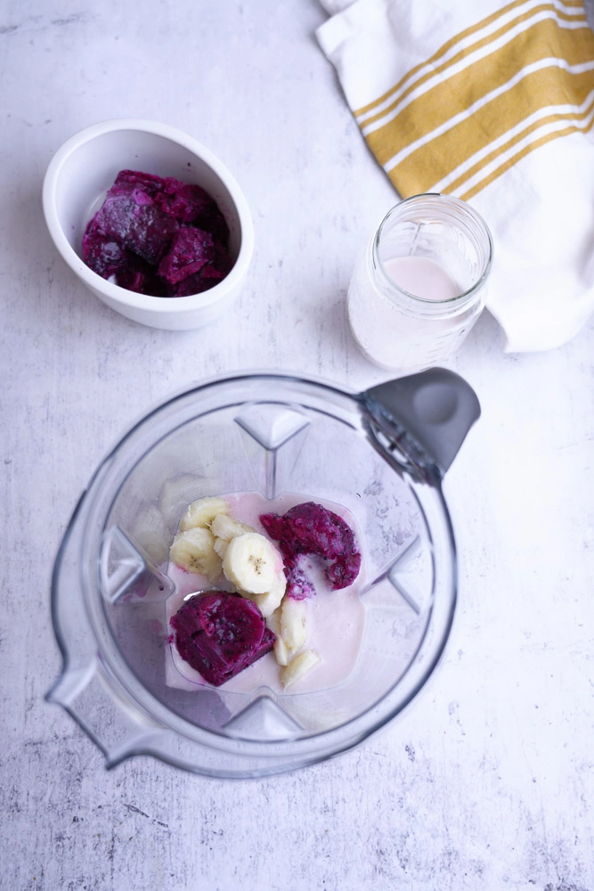 Dragon fruit, banana, coconut milk in a blender