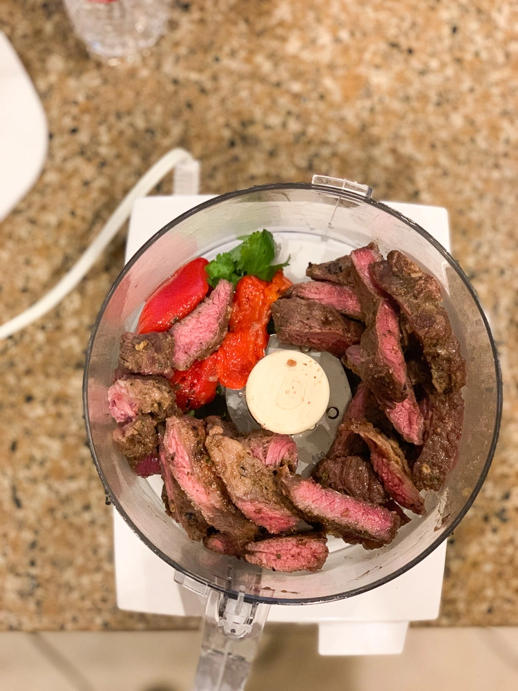 Skirt steak, cilantro and pepper in food processor