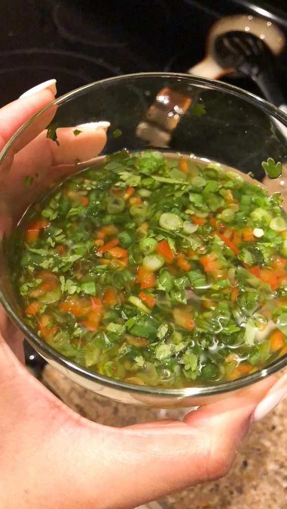 Colombian Aju sauce in a glass jar.