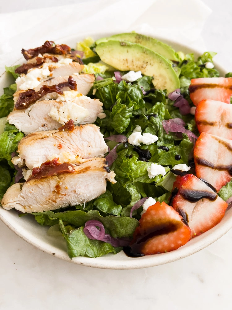lemon chicken salad with avocado, goat cheese and strawberries