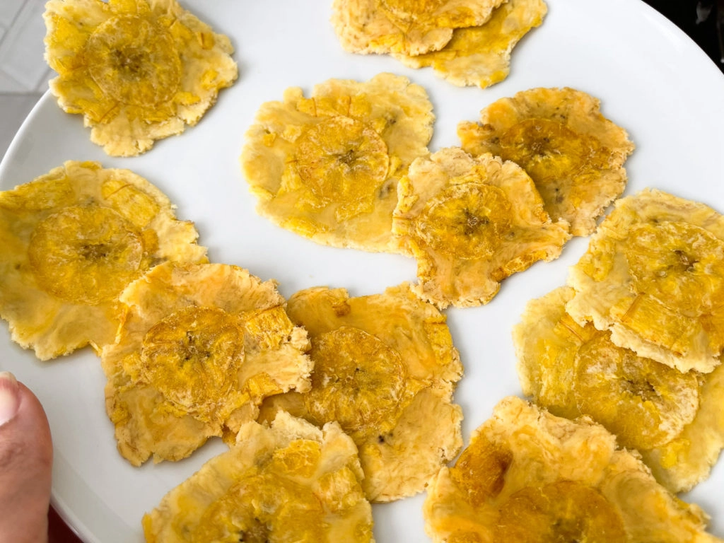 tostones in a white plate.