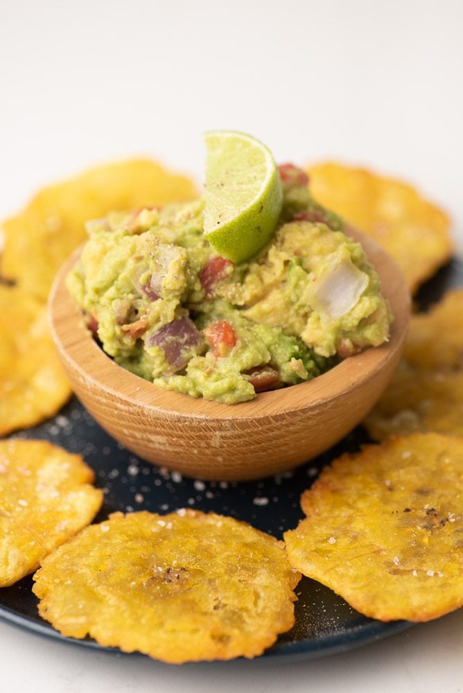 Patacones with guacamole on a bowl