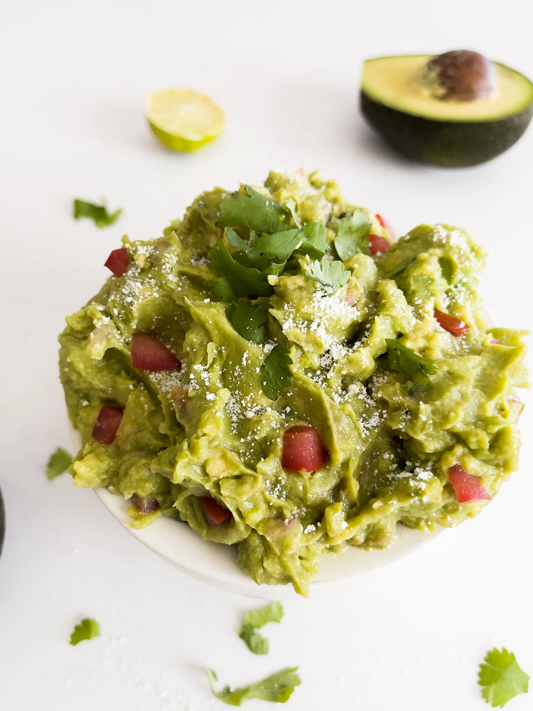 guacamole, avocado, lime wedge