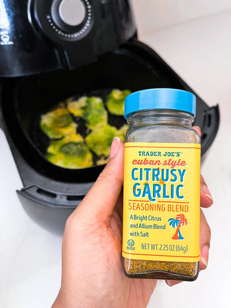 air fryer with Brussels sprouts and seasoning