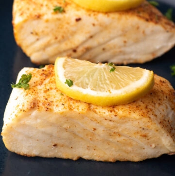 fish on plate with lemon