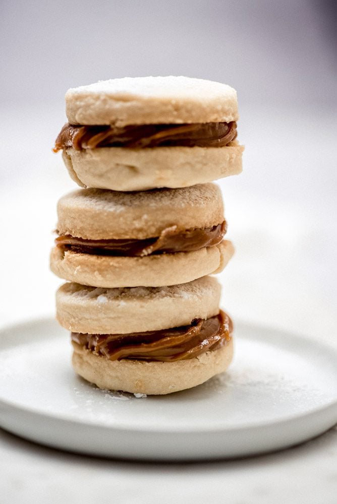 alfajores stacked on plate 