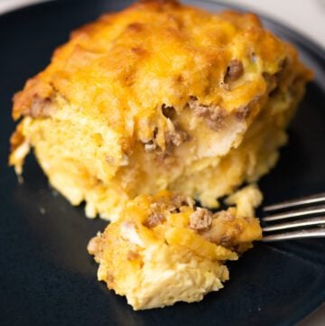 slice of breakfast casserole on a blue plate