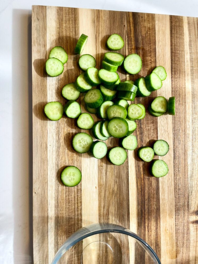 diced Persian cucumbers on a board