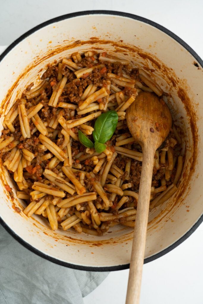 Cassarece on a pot with wooden spoon