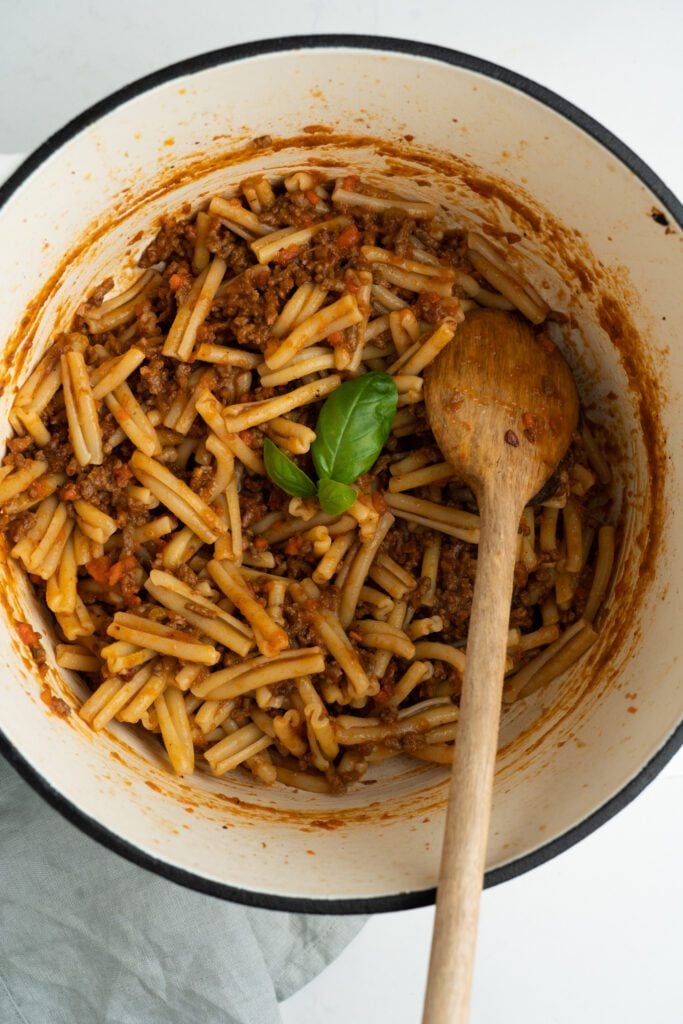 Cassarece on a pot with wooden spoon 