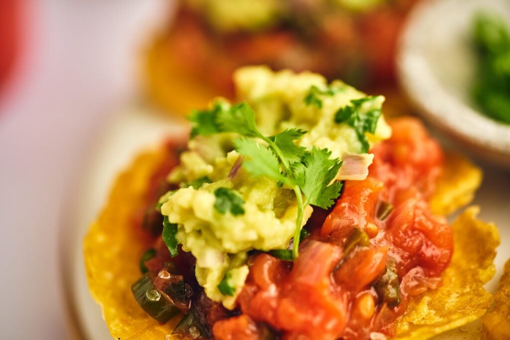 Patacones with guacamole and hogao