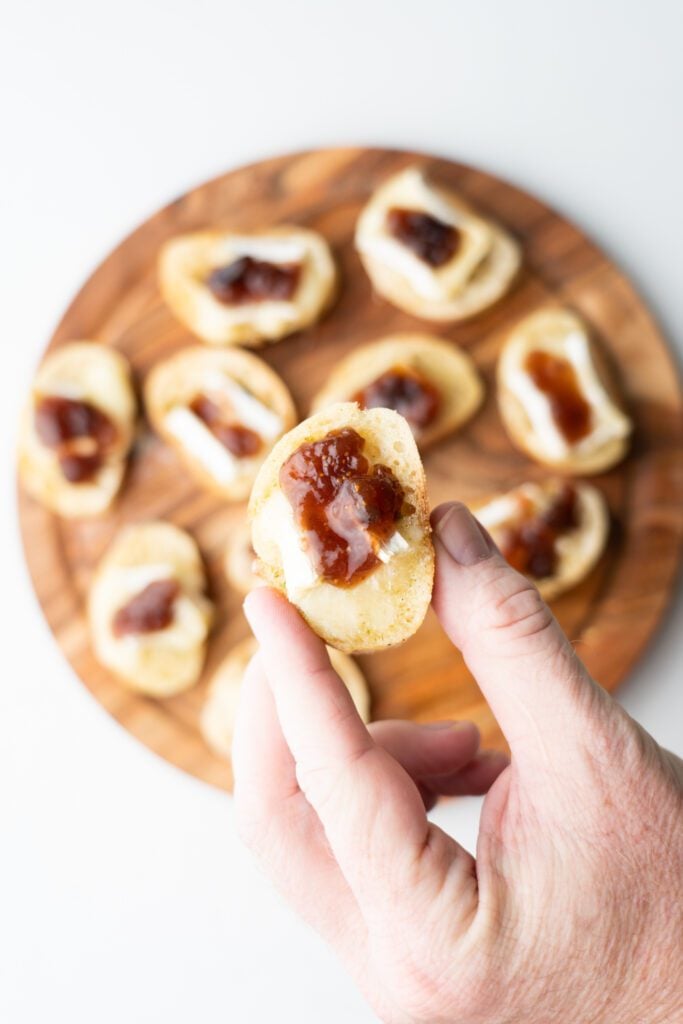 Crostini on a plater with fig and jam