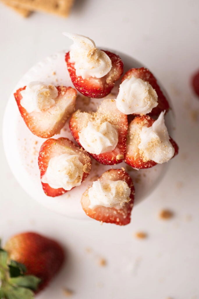 Strawberries with cream and graham cracker crumbs