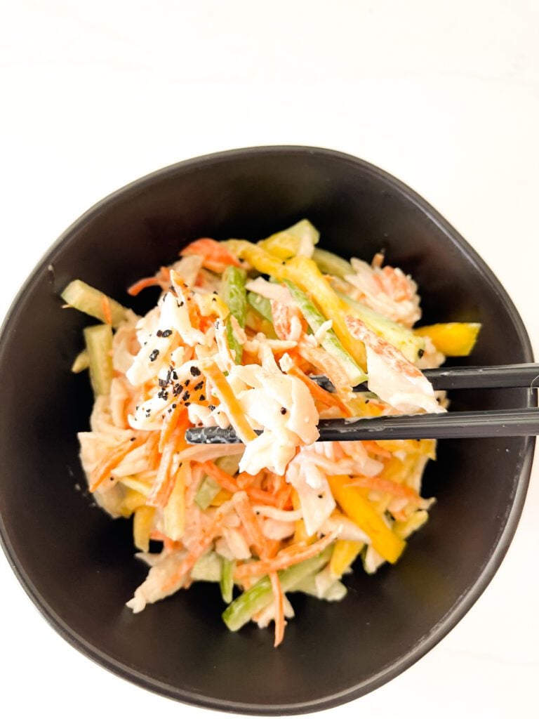 kani salad on a bowl with chopsticks