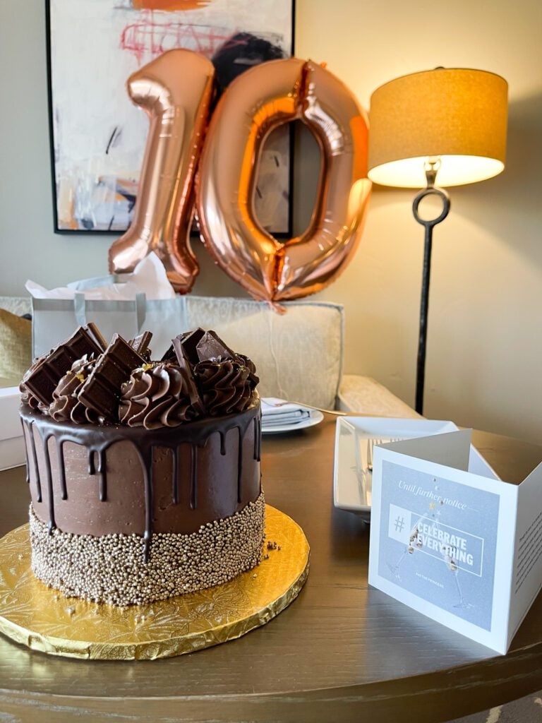 Chocolate cake with card on the side