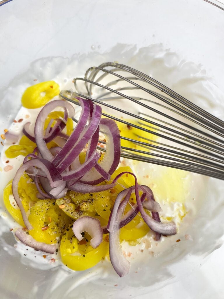 whisk with mayo, pepper and onions