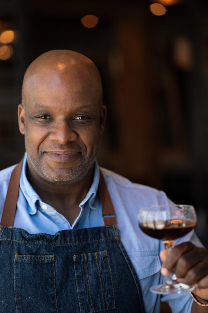 man holding cocktail Bartender Ian Lockhart