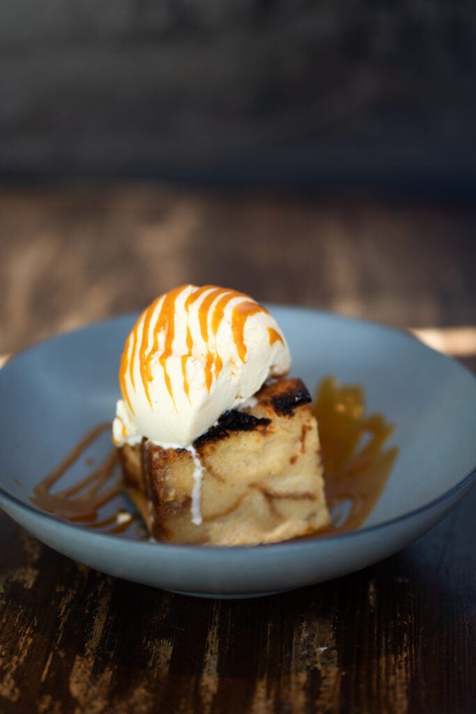 bread pudding with ice cream in a bowl