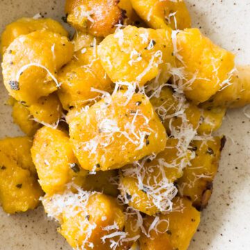 Sweet potato gnocchi with parmesan on a plate