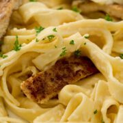 Blackened chicken with alfredo pasta.