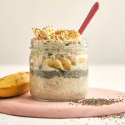 overnight oats in a hjar with chia seeds and sliced bananas.