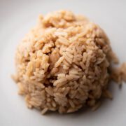 Caramelized coconut rice on a plate.