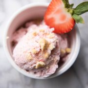 Cottage cheese ice cream with graham cracker and strawberry.
