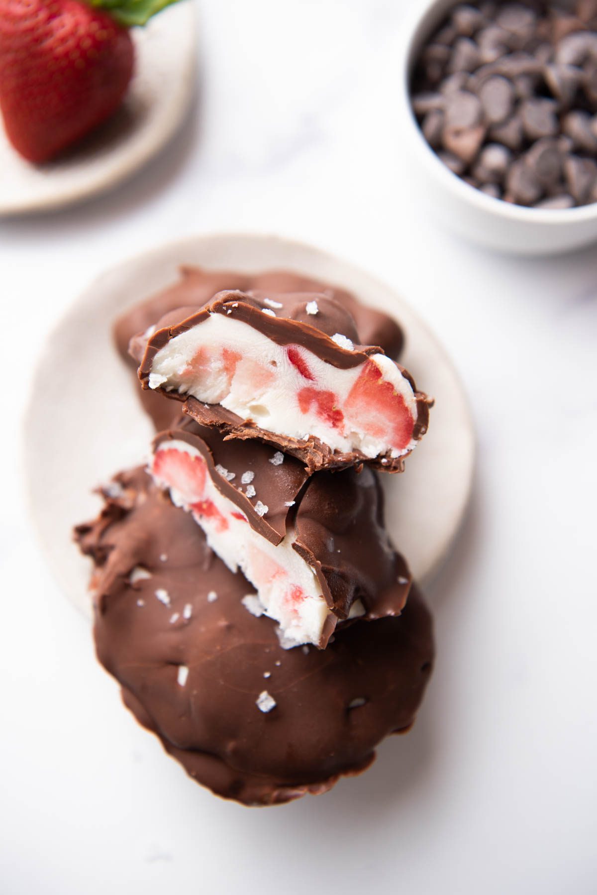 frozen yogurt with strawberry clusters covered in chocolate