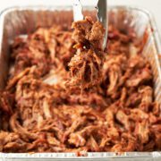 smoked puller pork on aluminum foil pan.