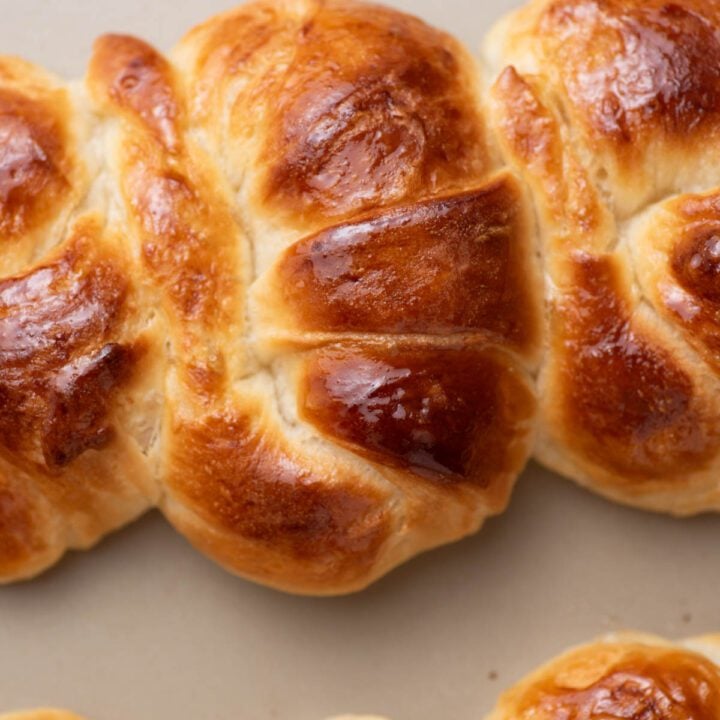 Medialunas Argentinas on a baking sheet.