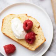 Yogurt cake with whipped cream and berries.