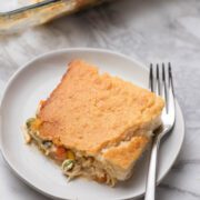 Turkey cobbler on a plate with a fork.