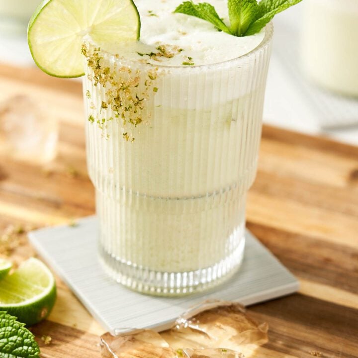 Brazilian lemonade with ice and mint leaves.
