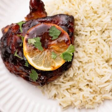 Honey-Garlic-Lemon-Pepper-Chicken-Thighs served over rice.