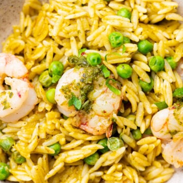 Red Argentinian shrimp with chimichurri on a bowl.