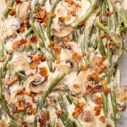 Green bean casserole with bacon and mushrooms.