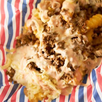 Dominican Yaroa with French fries, ground beef, cheese and sauce.