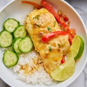 Halibut in a Thai-inspired coconut curry with rice and cucumbers.