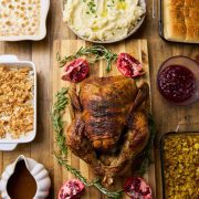 ALDI Thanksgiving menu including turkey, gravy, mashed potatoes, sweet potato casserole, cranberry sauce, cornbread stuffing and dinner rolls.